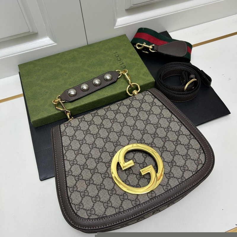 G*u*i top handle bags
